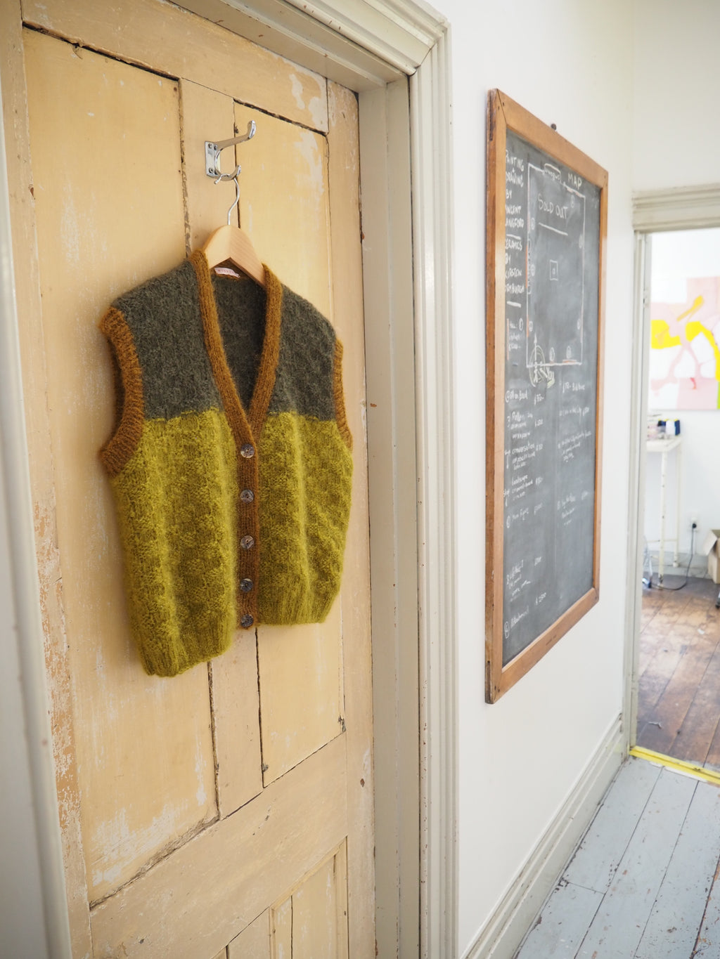 Hand knit vest - School house